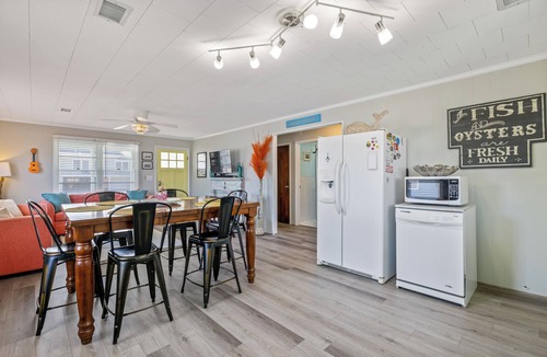 Colington Cottage | The Way Back: Cozy Cottage Steps to Beach + Hot Tub + Coffee with Private Suite