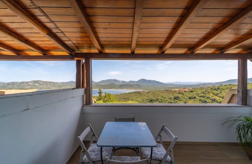 Cugnana Verde Apartment | This is unique space and enjoy the panoramic view of the mountains and the gulf.