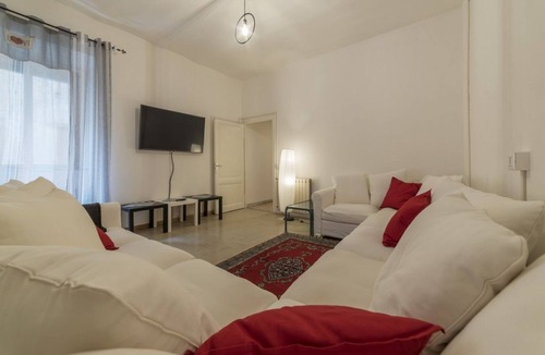 Salario Apartment | This spacious 180sqm apartment with four bedrooms is able to accommodate up to 8 people. Located on the first floor (with elevator) of a restored period building, the apartment overlooks the private park of Villa Albani, one of the most beautiful and pea