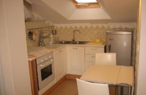 Oristano Apartment | Top floor penthouse apartment with terrace in the historical center, 3 km from the beach