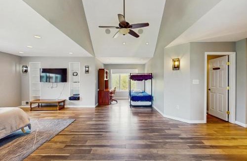 Livingston House | Updated lakefront home & studio with water views, hot tub, dock & game room