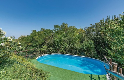 Castelnuovo Calcea House | Vacation home with pool and panoramic views of the Monferrato vineyards that reach the Alps.