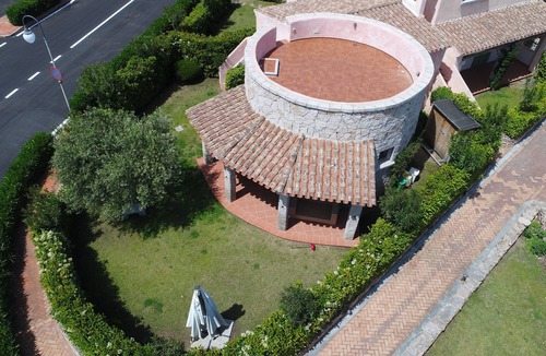 Porto San Paolo House | Wonderful head-end villa with large garden and solarium