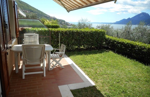 Assenza Apartment | Wonderful lake view with private garden and pool among olive trees