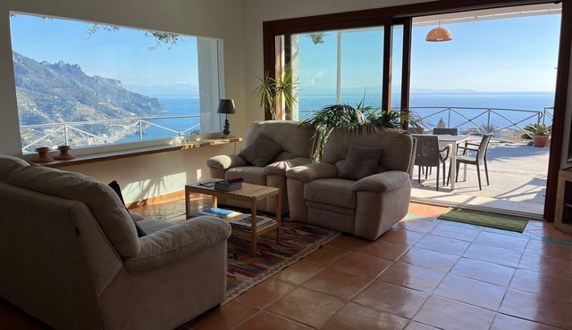 Aeolus house with exceptional views, patio and furnished garden with parking.