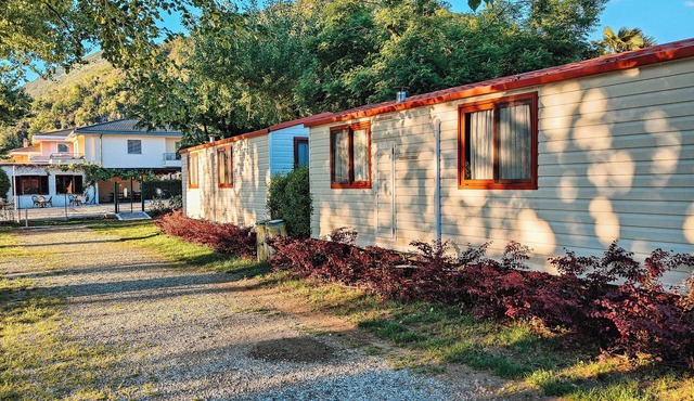 Charming 2-bedroom Tiny House at the Lake in Maccagno with WiFi, AC