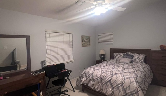 Charming bedroom in a welcoming Palmdale home with AC, WiFi