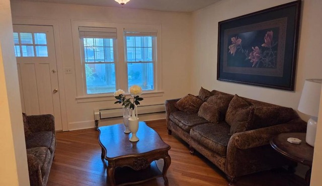 Charming Bungalow on a end st sits on a park