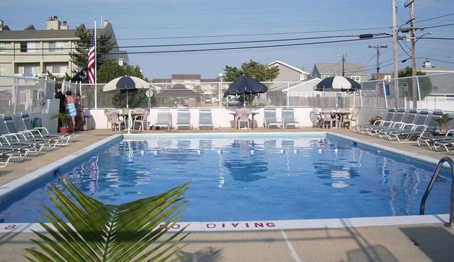 Heated Pool , One Block to Private Beach