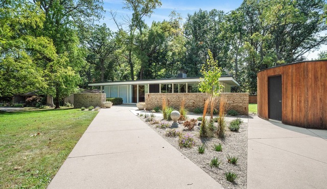 Midcentury Glass Getaway with Pool