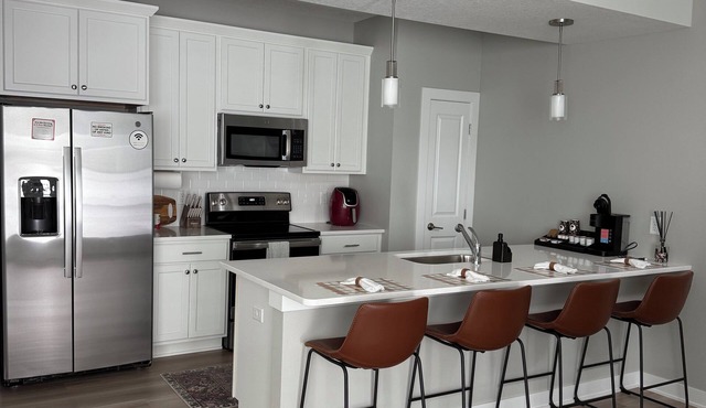 New, spacious, 3 bedroom 2.5 bath townhome in a peaceful Urbandale, IA!