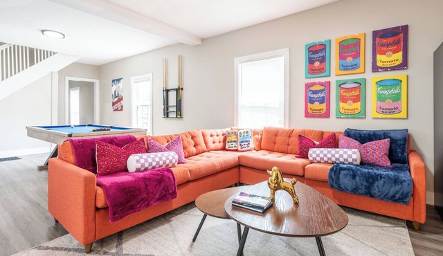 Play pool, shuffleboard, and more in this Pop Art inspired clubhouse!