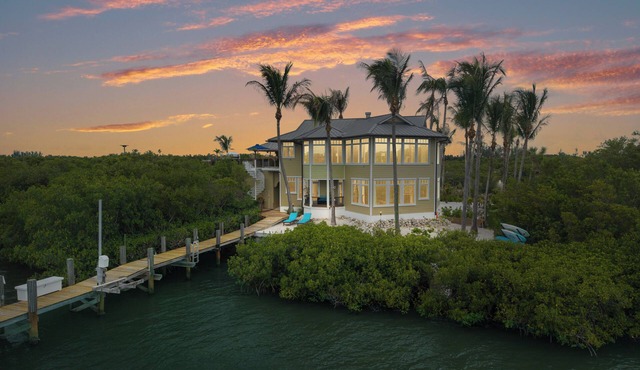Stunning Riverfront Home with Private Beach and Close to the Ocean.