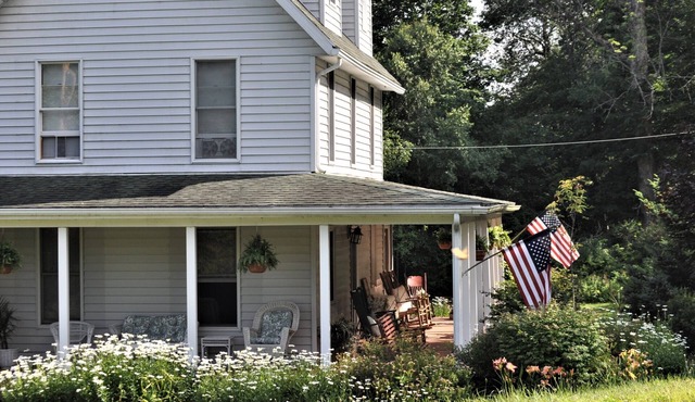 Two Bedroom Across from Outlet Pond on edge of village and wooded trails.