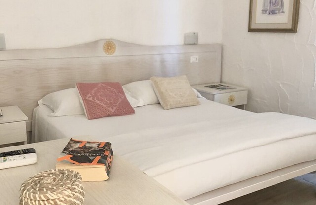 Residence with swimming pool on the sea CALA CATERINA
