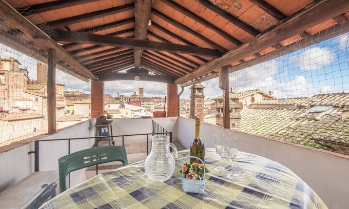 Siena Historical Center Apartment | Apartment 'Il Campo Comfort Apt with Balcony' with Private Terrace, Wi-Fi and Air Conditioning