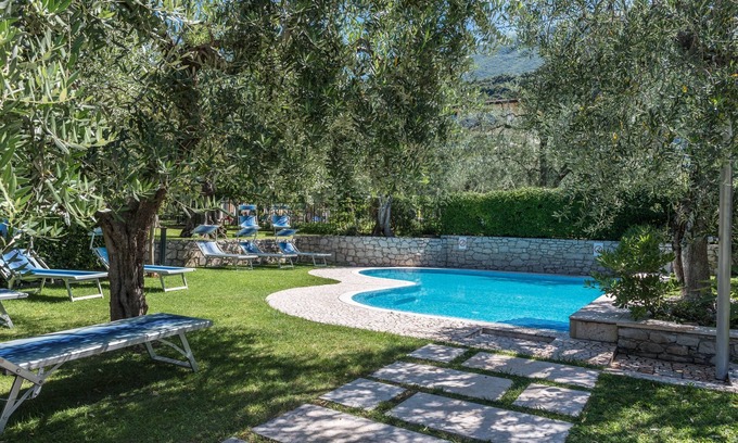 Malcesine Apartment | Apartment 'Residence La Pergola Trilocale' with Mountain View, Wi-Fi and Air Conditioning