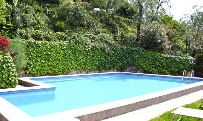 Magugnago Apartment | Cosy apartment for 3 guests with A/C, WIFI, pool, TV, balcony and parking