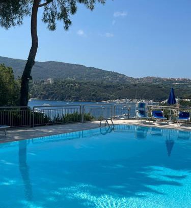 Porto Azzurro Apartment | FREE PARKING Pool with a sea view