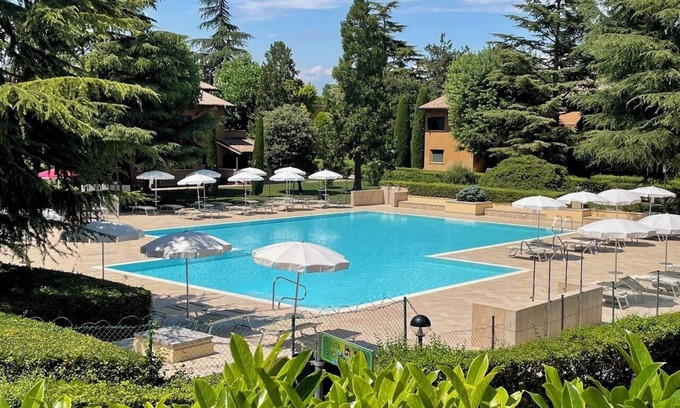 San Benedetto di Lugana Apartment | Holiday Apartment "Casa Punta Grò" with Shared Pool, Terrace & Wi-Fi