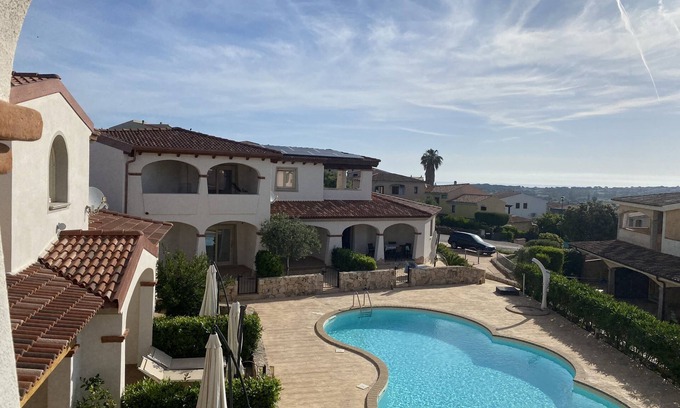 Limpiddu Apartment | Limpiddu Residence with pool and sea view - New, all amenities