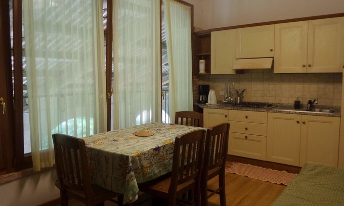 Longare Apartment | Tigli apartment with two bedrooms and one bathroom on the second floor with 4 metre glass window (apartment 6)