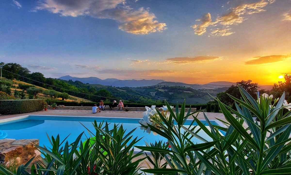 Penna San Giovanni House | San Isidore, a meticulously restored historic Italian home with a stunning pool.