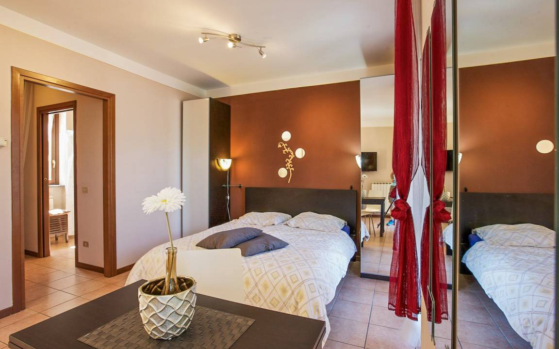 Photo of Bedroom in Maccagno con Pino e Veddasca