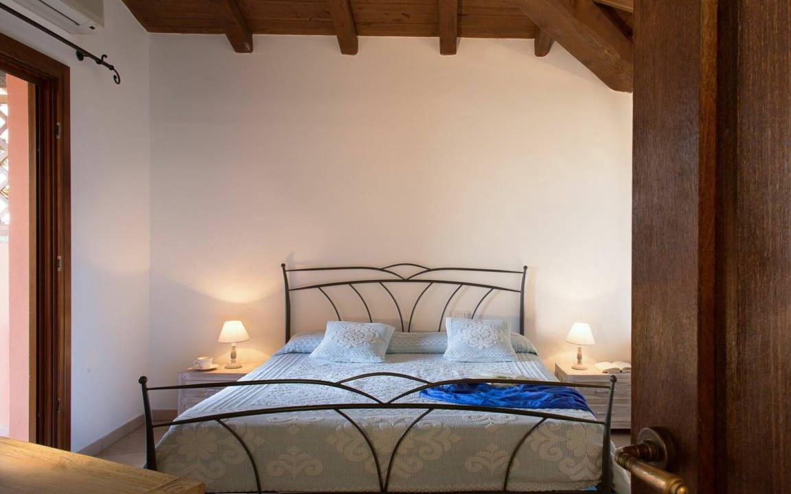 Photo of Bedroom in Capo Coda Cavallo