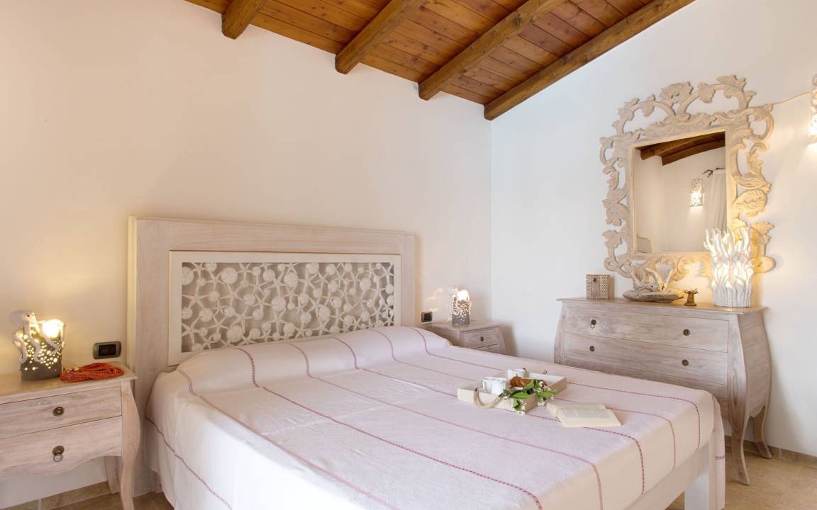 Photo of Bedroom in Capo Coda Cavallo