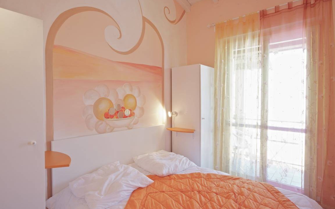 Photo of Bedroom in Maccagno con Pino e Veddasca