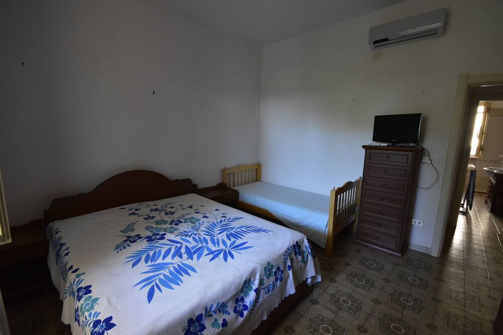 Photo of Bedroom in Torre Santa Sabina