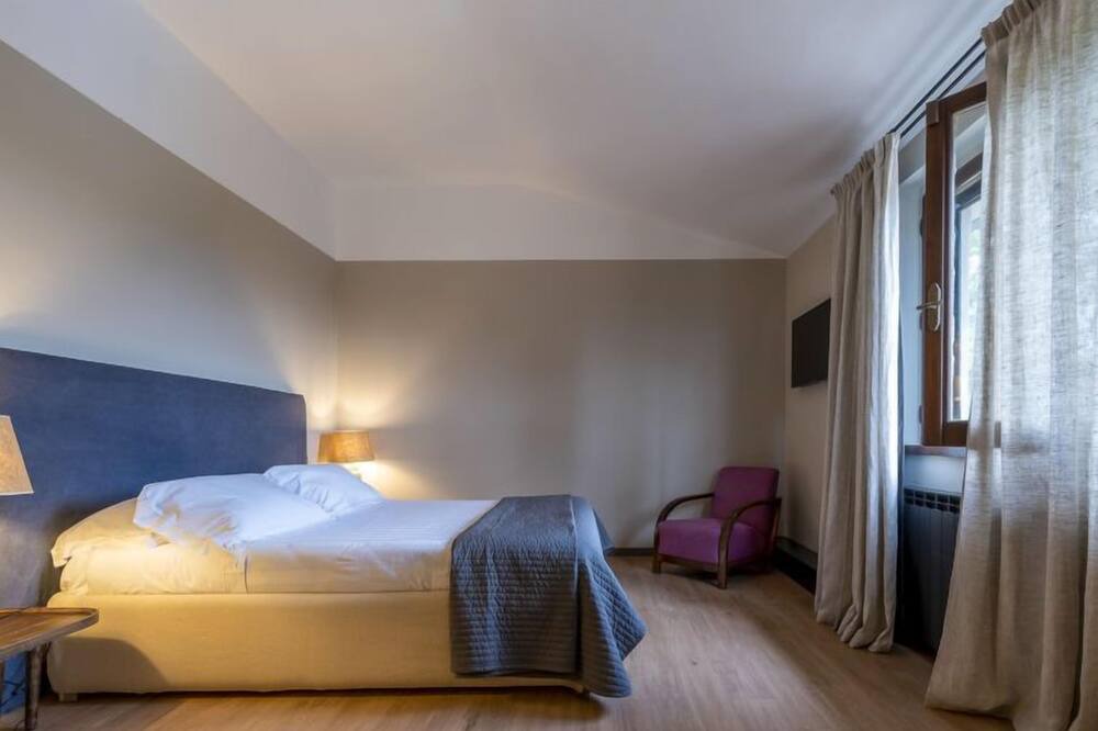 Photo of Bedroom in Passignano sul Trasimeno