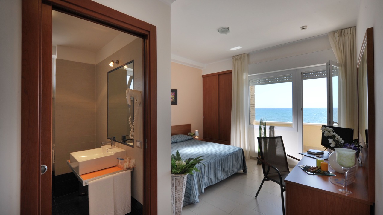 Photo of Bedroom in Lido di Capo Portiere