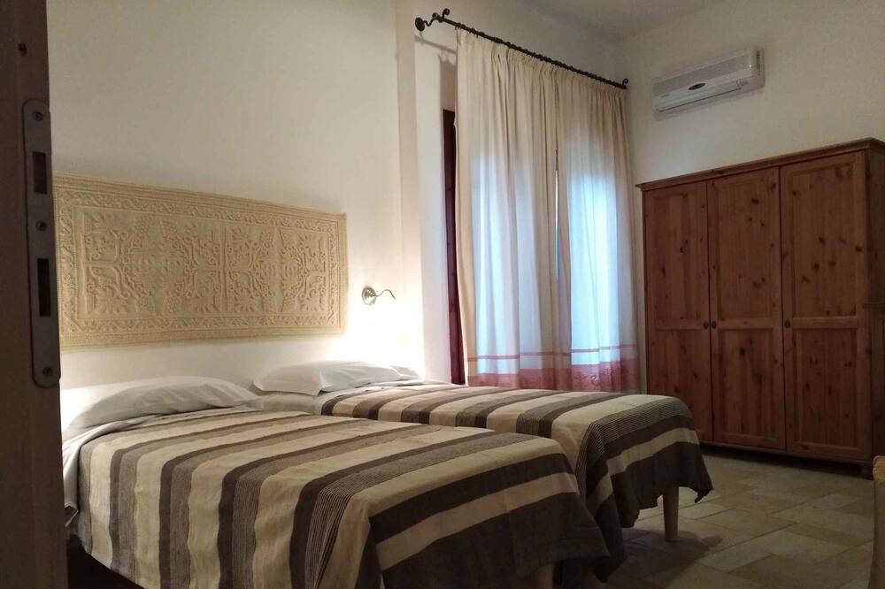 Photo of Bedroom in Santa Margherita di Pula