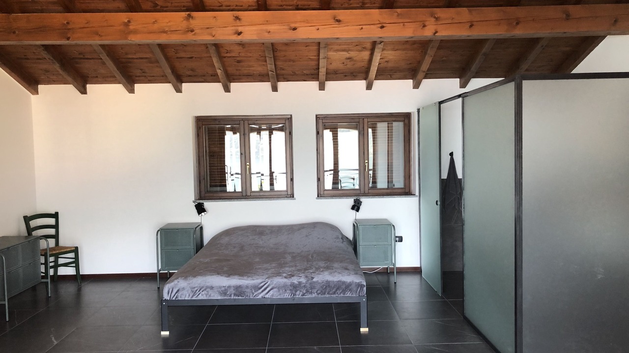 Photo of Bedroom in Maccagno con Pino e Veddasca