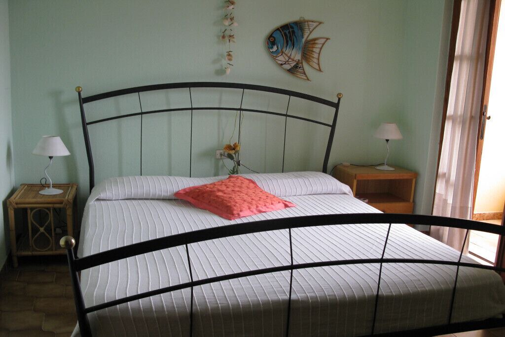 Photo of Bedroom in Cala Sinzias