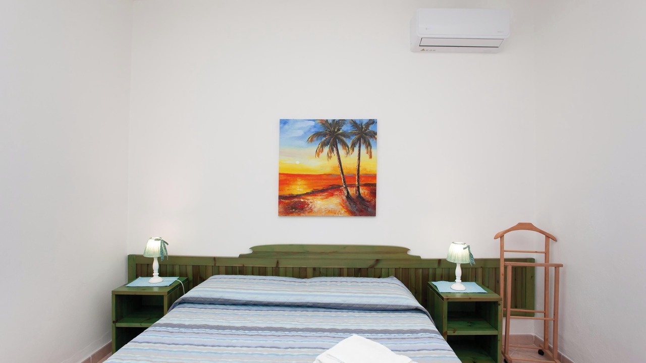 Photo of Bedroom in Cala Liberotto