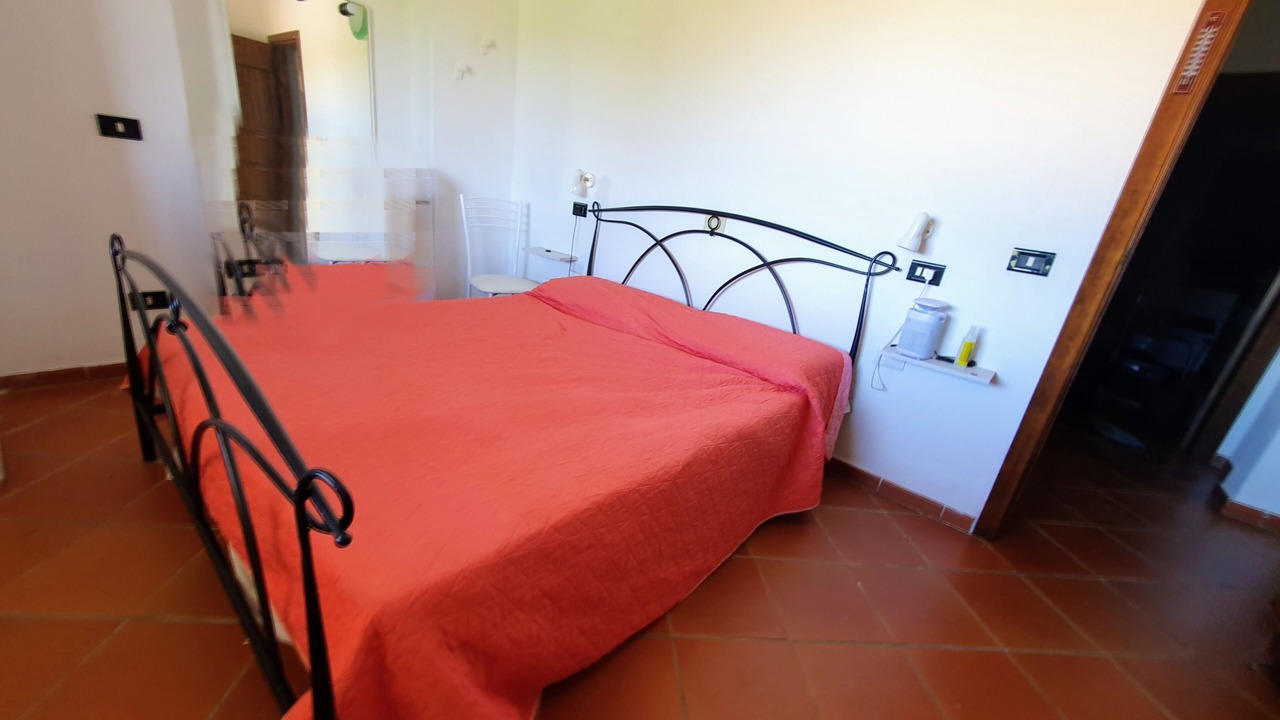 Photo of Bedroom in Capo d'Orso