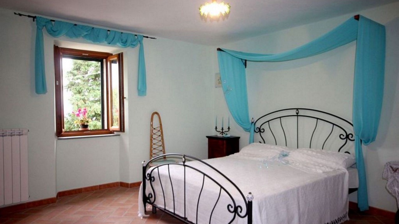 Photo of Bedroom in Castiglione di Garfagnana