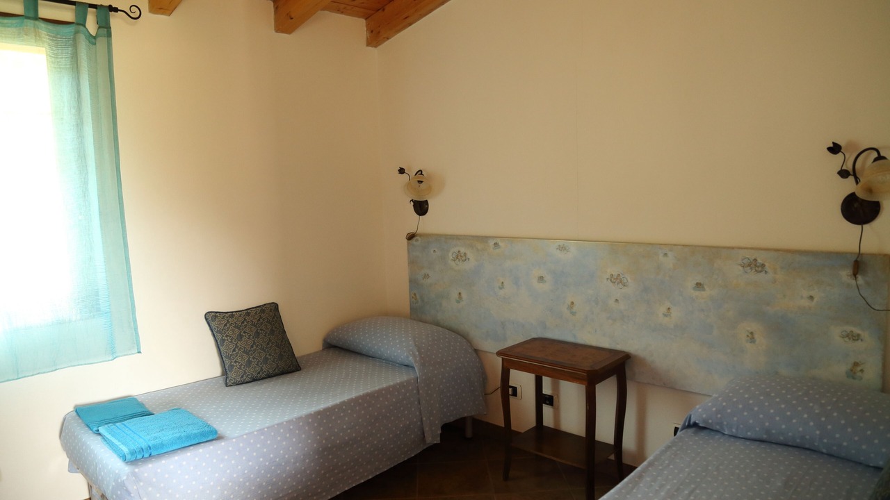 Photo of Bedroom in Cala Sinzias