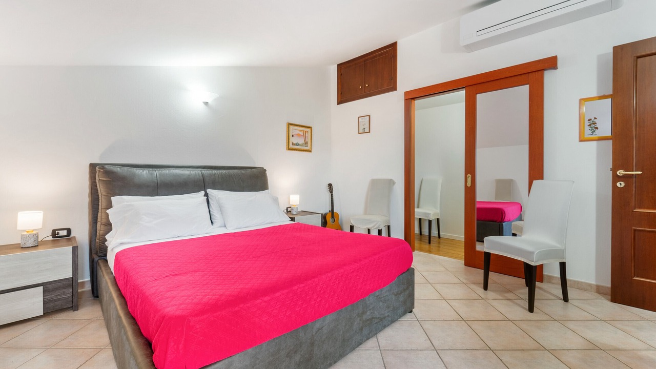 Photo of Bedroom in Iglesias Historic Centre