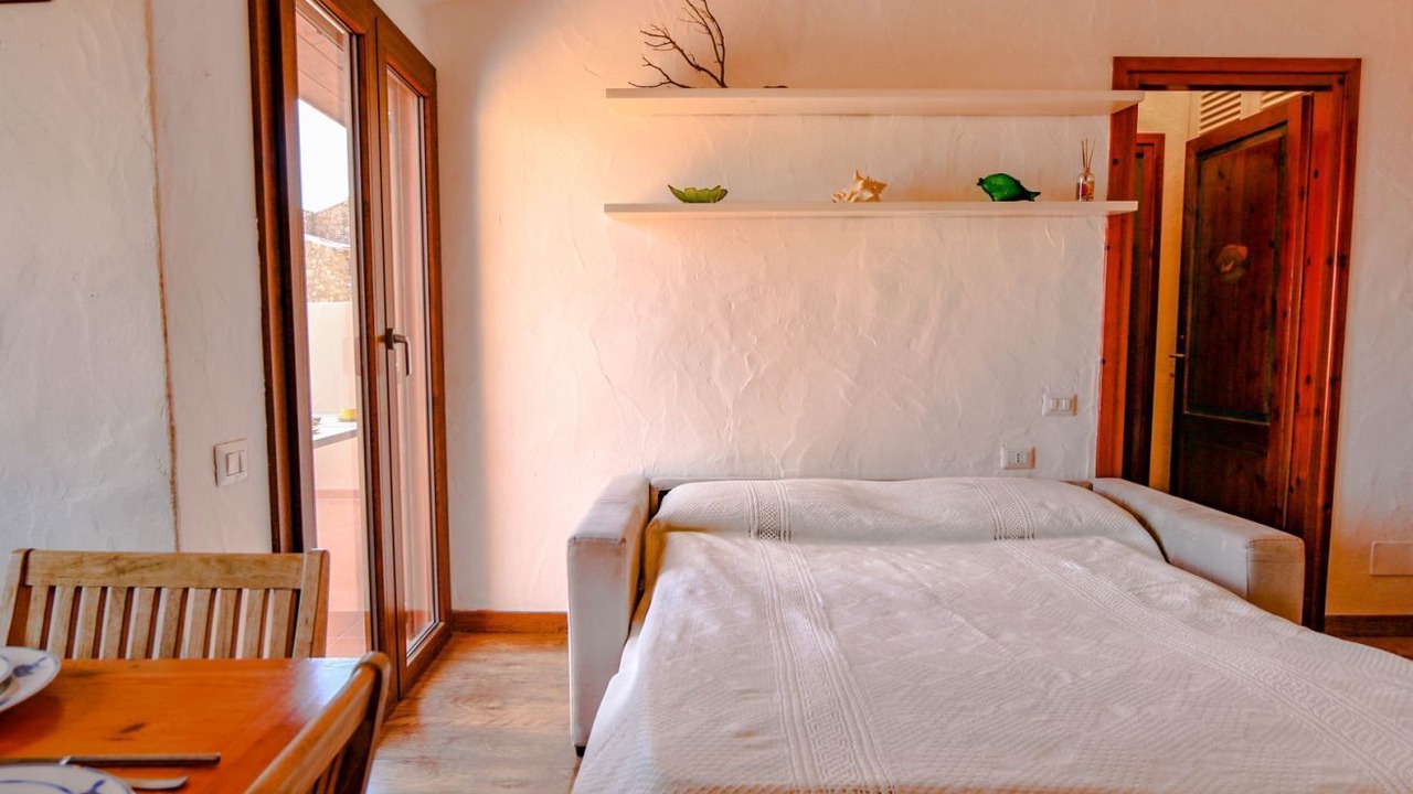 Photo of Bedroom in Capo Coda Cavallo