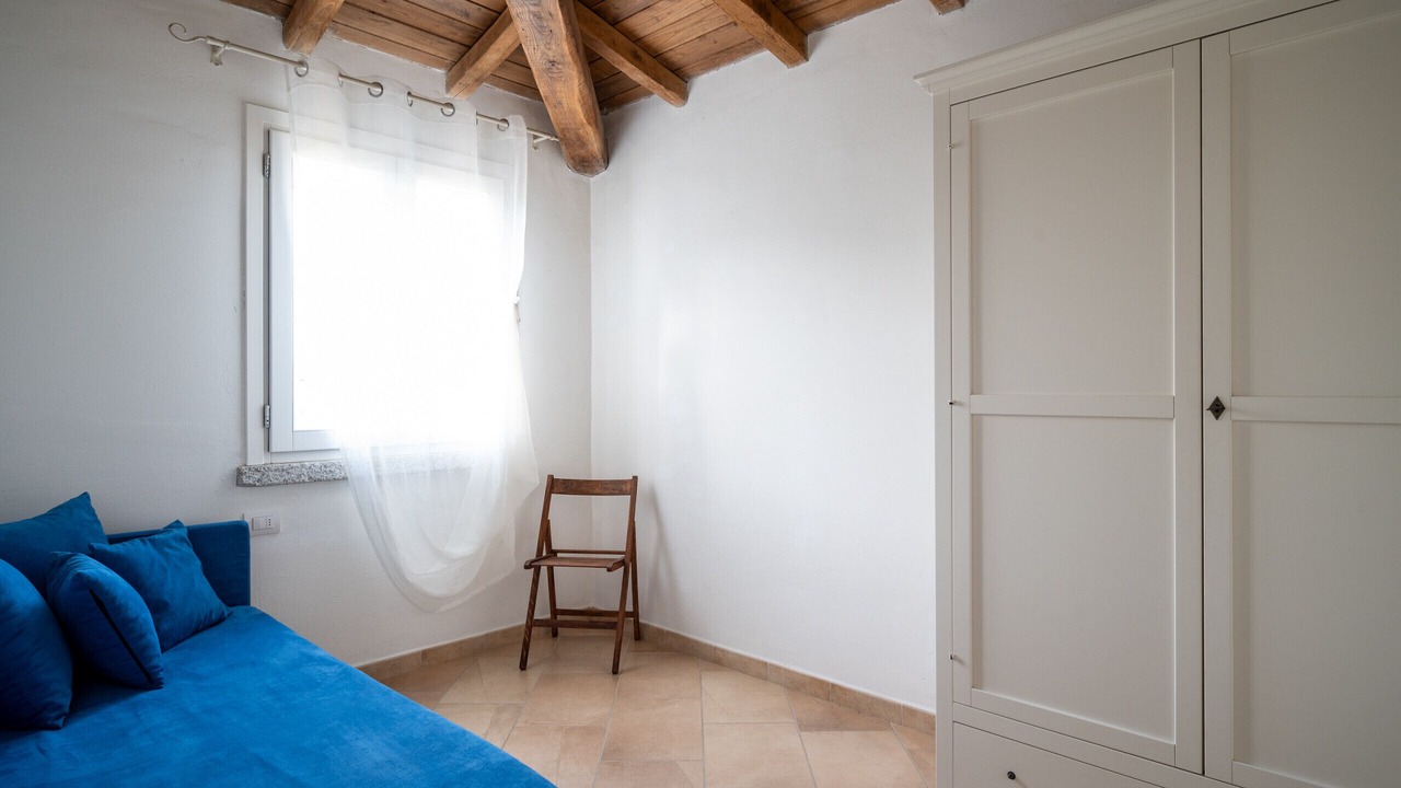 Photo of Bedroom in Case Peschiera-Lu Fraili