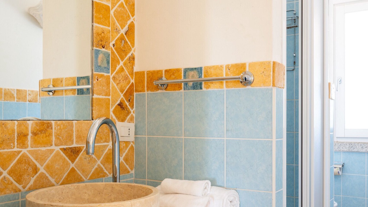 Photo of Bathroom in Case Peschiera-Lu Fraili
