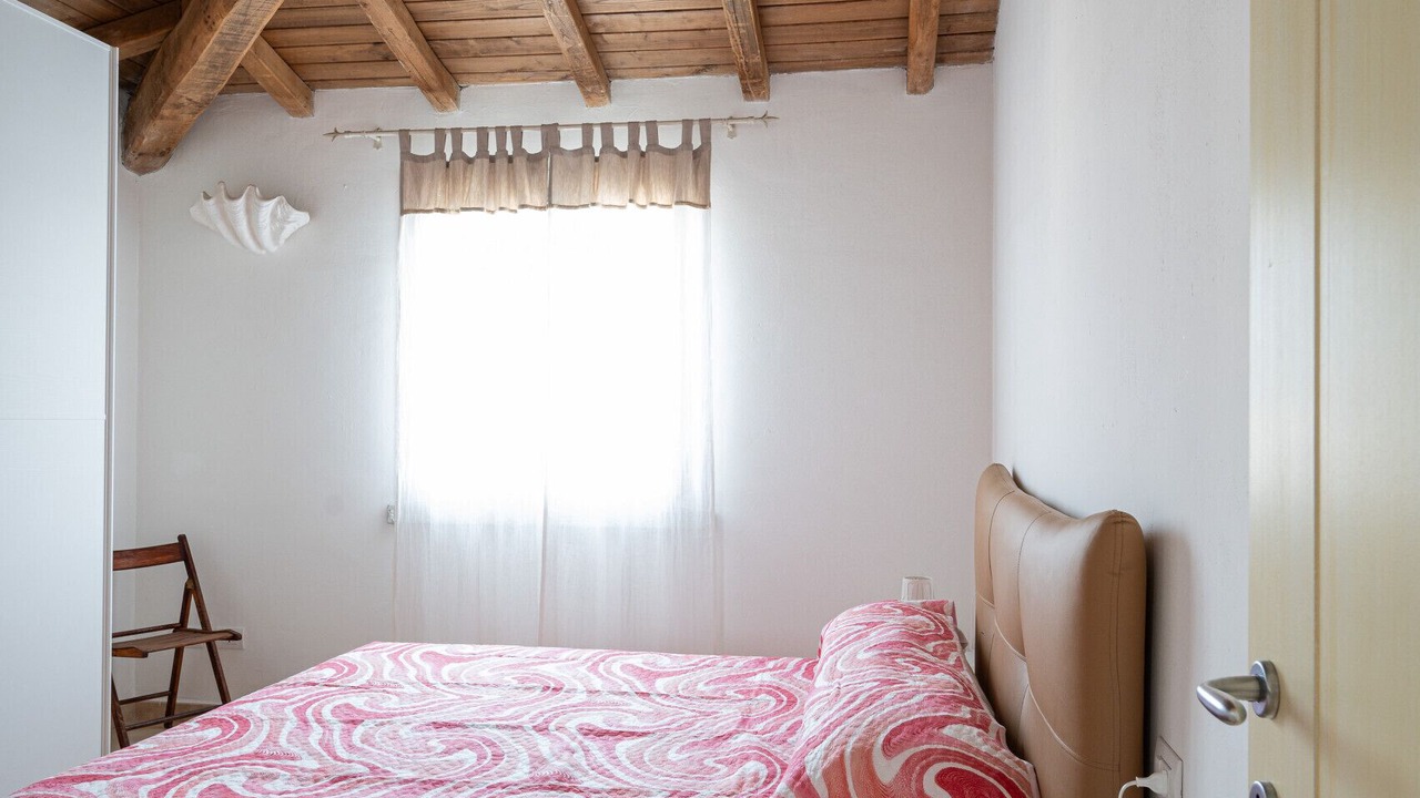 Photo of Bedroom in Case Peschiera-Lu Fraili