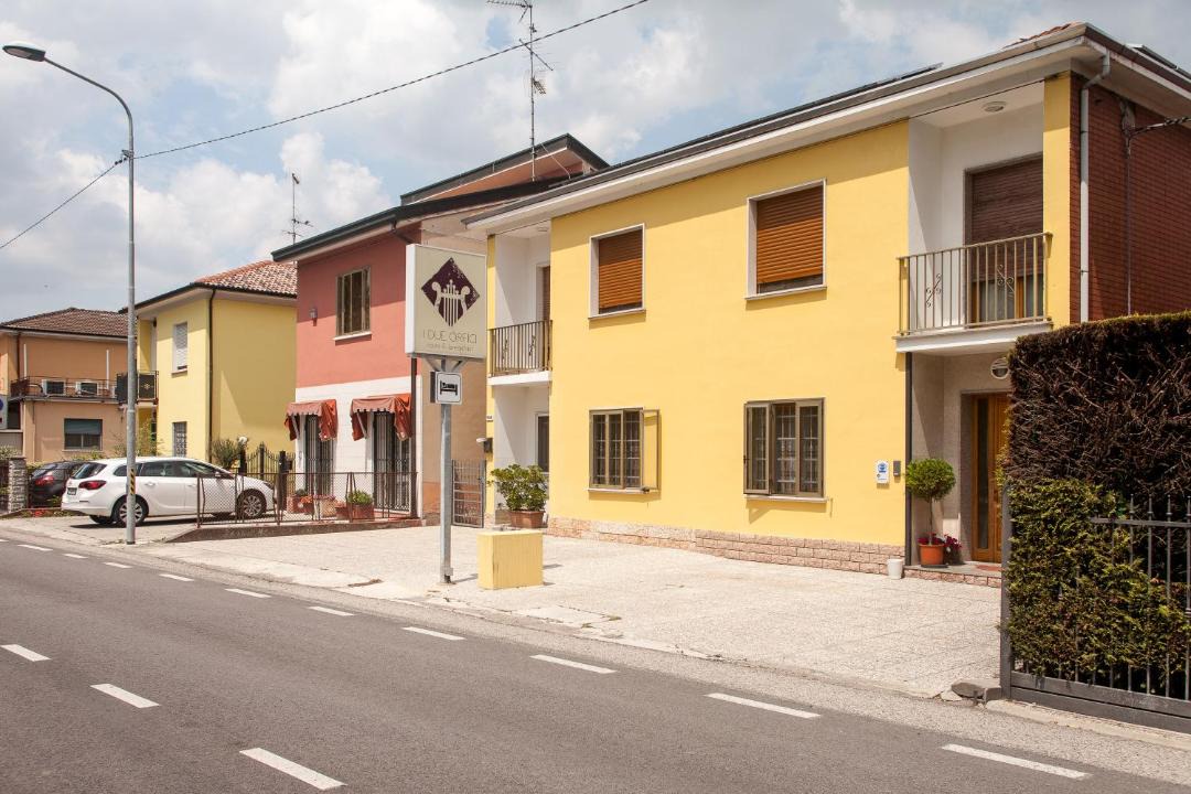 Photo of Buildings in Cona