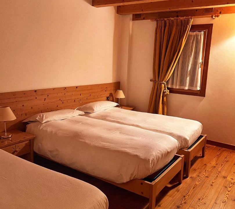Photo of Bedroom in Taibon Agordino