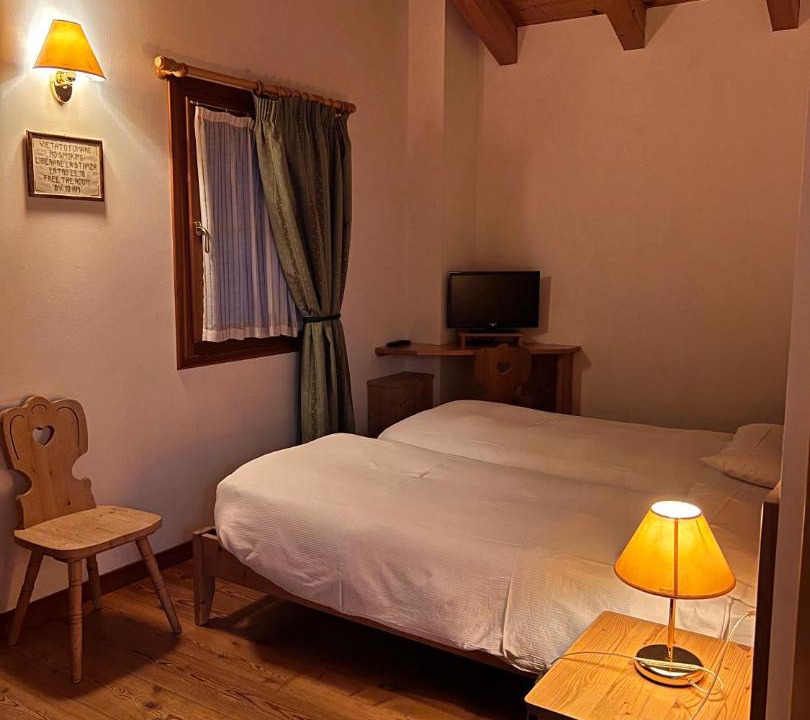 Photo of Bedroom in Taibon Agordino