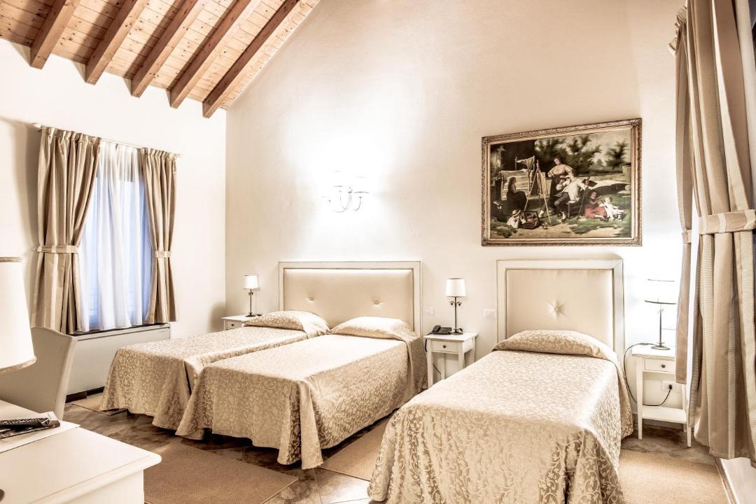 Photo of Bedroom in Corte de'Cortesi Con Cignone